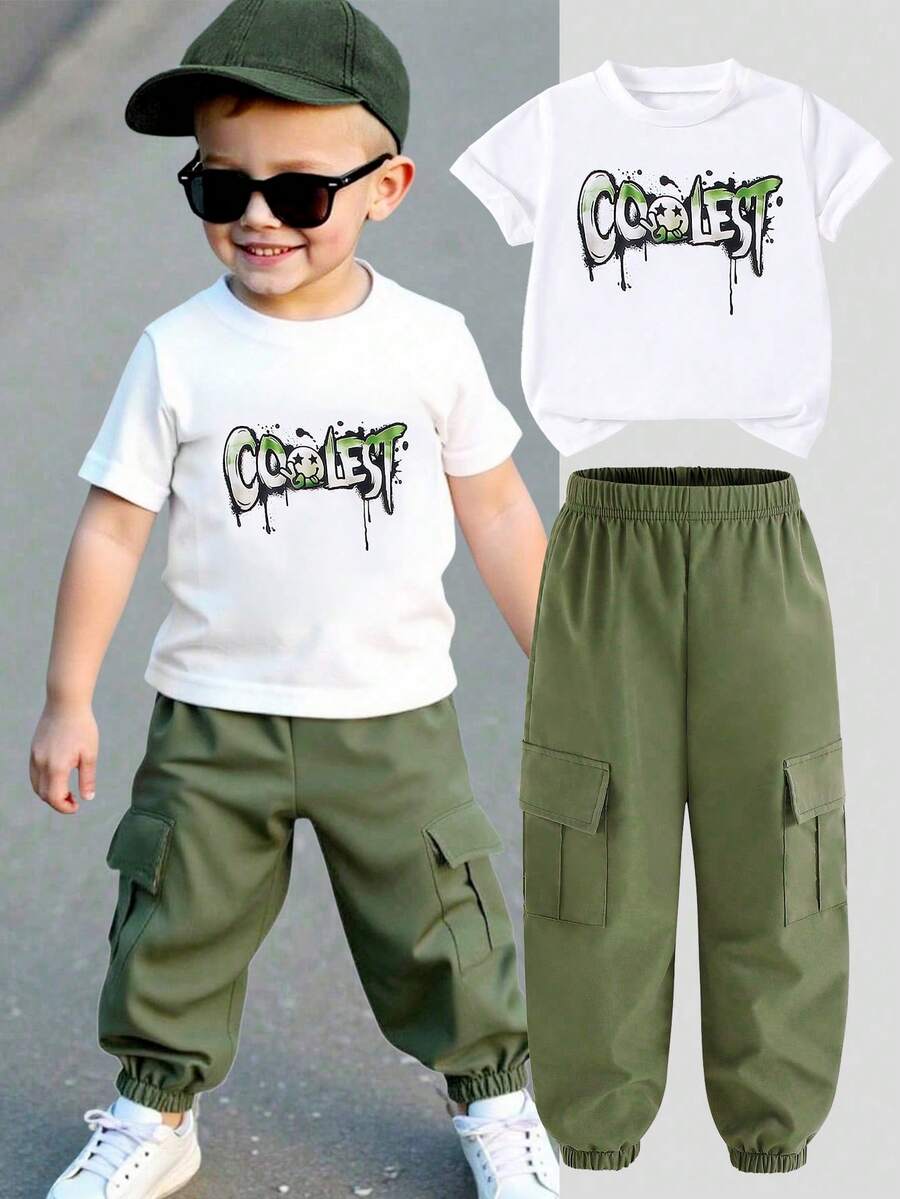 2pcs/Set Young Boys' Outfit, Includes White Short Sleeve T-Shirt With "COOLEST" Graffiti Print And Military Green Cargo Pants. Casual And Style To Showcase Kids' Lively And Energetic Personalized.
