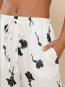 COSMINA Quần ống rộng dáng suông, thắt dây eo, họa tiết hoa dành cho nữ. - trắng - Xem 2
