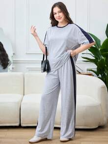 2件套少女休闲运动家居服纯色拼接宽松圆领短袖T恤和阔腿裤返校套装，灰色和藏蓝色针织圆领宽松落肩休闲套装，简约休闲街头运动休闲两件套，返校套装，可爱假日家庭户外春季野餐日常休闲两件套，适合各种场合 - 灰色 - 查看 6