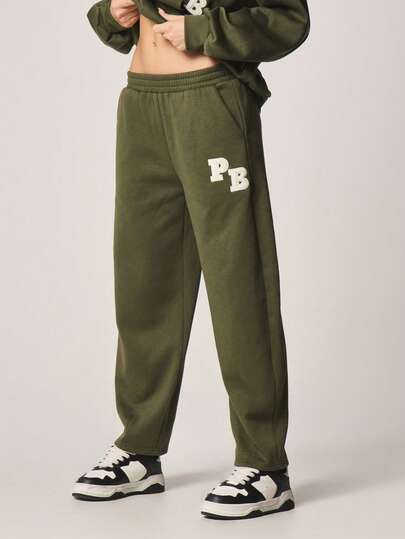 Missguided x Playboy 印花弹力腰带宽松运动裤，休闲舒适，适合日常穿着和放松休闲。