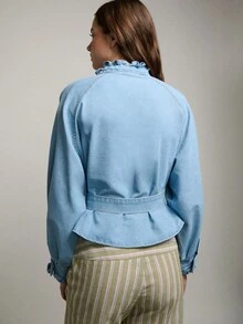 Nöista Light Blue Denim Blouse Features A Ruffled Collar, Button-Down Front, And Puffed Sleeves With Ruffled Cuffs. Waist Tie, The Peplum Silhouette For A Flattering Fit. Spring, Summer. - Light Wash - View 2