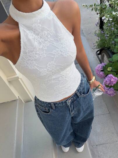 Muchica Women's Lace Backless Camisole, Suitable For Outdoor Wear, Streetwear, Y2K Style Clothing, Lace Pattern. This Sexy, Pure White Backless Halter Top Is Perfect For The Office, Casual Occasions, And Going Out. It's Fashionable And Versatile.