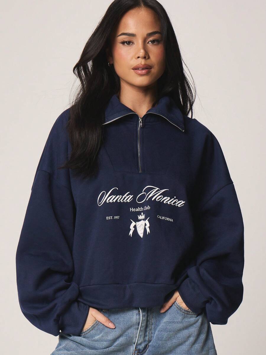 MISSGUIDED 海军蓝四分之一拉链套头卫衣，圣莫尼卡印花，翻领长袖宽松休闲舒适上衣 - 藍色 - 查看 1