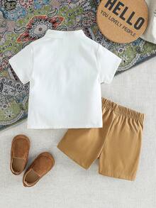 SHEIN Baby Boy Totem Embroidery White Short Sleeve Mandarin Collar Shirt And Khaki Shorts Set, Suitable For Spring/Summer, Casual, Outdoor, Vacation, Party And Other Occasions - Multicolor - View 2