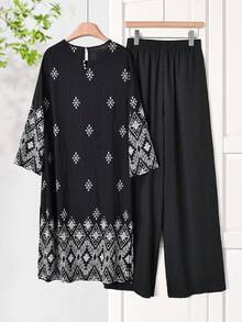 Rusticease 女士纯色圆领短袖上衣和印花阔腿裤套装，夏季两件套 - 黑與白 - 查看 2