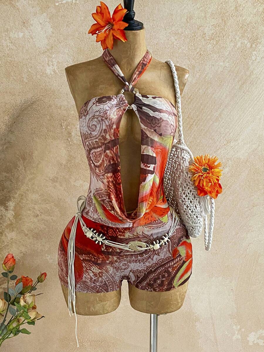 Soleia Trang phục dự tiệc cưới phong cách miền Tây, thường ngày, thoải mái, phù hợp cho kỳ nghỉ, lễ tốt nghiệp, tiệc brunch, ngày lễ Thánh Patrick, kỳ nghỉ xuân, lễ Phục sinh, lễ hội âm nhạc, thanh lịch, phong cách Bohemian, nhiệt đới, gợi cảm, cổ áo xếp nếp sâu, trang trí kim loại, lưới in họa tiết, áo liền quần cổ yếm khoét lỗ. - Nhiều màu - Xem 1