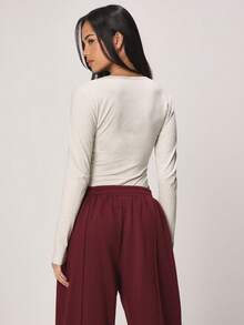 MISSGUIDED Long Sleeve Button Front Henley Bodysuit With Ribbed Knit Fabric And Classic Crew Neckline For Casual Everyday Wear