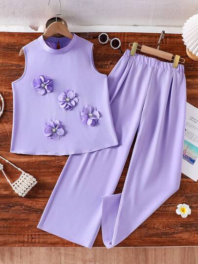 Elegant, ärmlös blus och byxor med krage och blomdekor för tweenflickor, 2-delat set