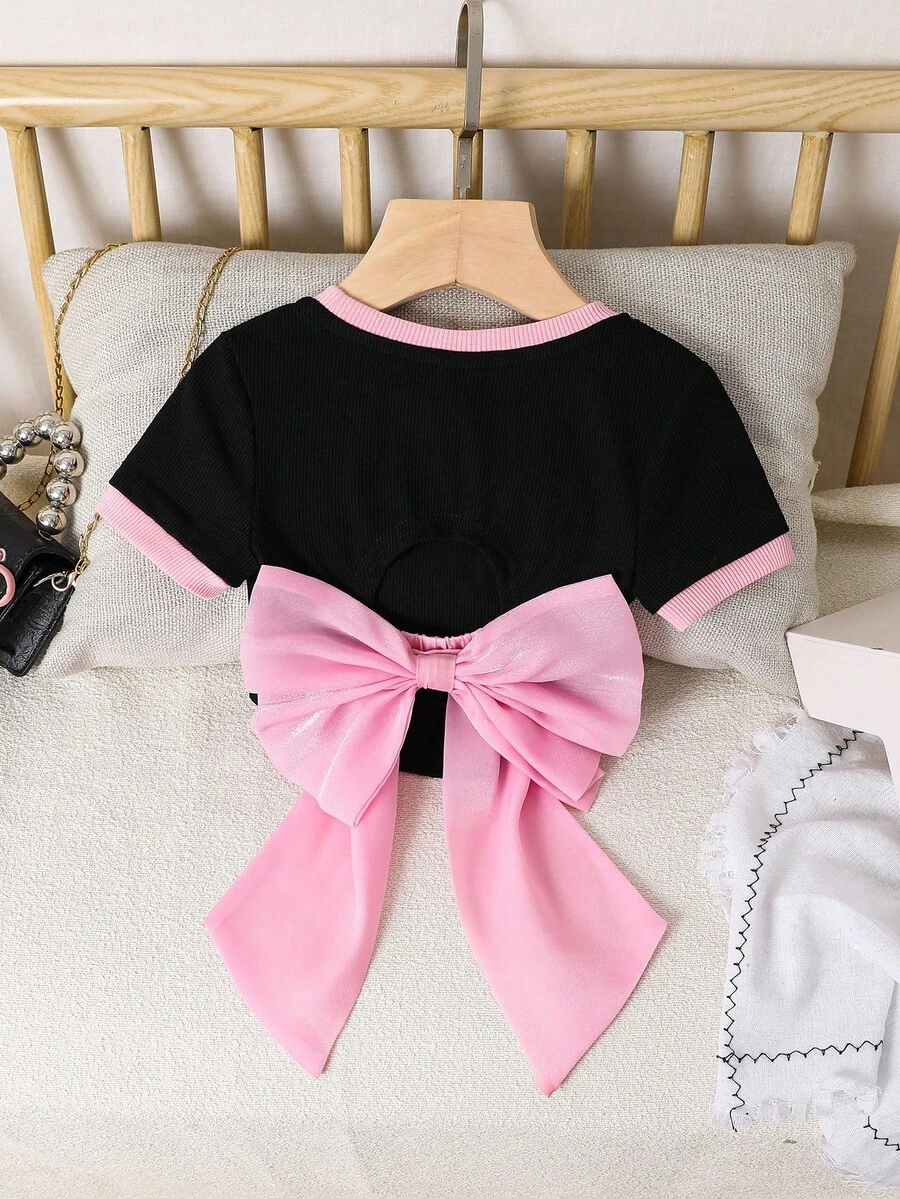 SHEIN Cute Baby Girl Knitted Solid Color Block Slim Fit Short-Sleeve T-Shirt With Open Back And Organza Bow Decoration. Fashionable French Elegance, Back To School, Y2K, Sweet And Cool, Individualistic And Ladylike. Bow Baby Clothes Pink And Black Toddler Outfit Elegant Tops For Toddler Girls Baby Girls Bow Tshirts - Black - View 1