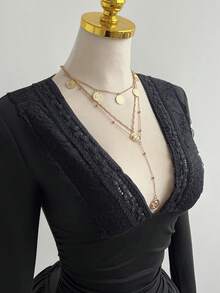 Elamini 女士休闲黑色V领荷叶边修身褶皱长袖短连衣裙