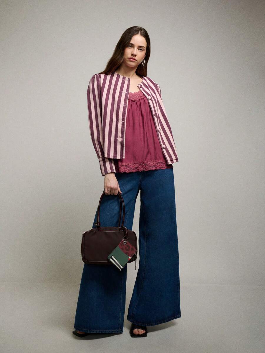 Nöista Romantic Loose Top With Detailed Lace Trimming On Neckline. Straps Adjustable On Back. Spring Outfit , Spring Break Outfits, Spring Clothing, Casual Outfit, And Vacation Styling. - Red Violet - View 1