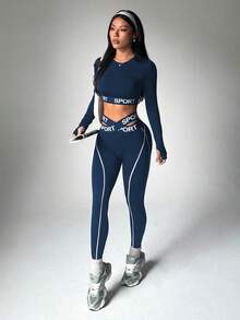 Dewbera 两件套女士无缝撞色条纹图案交叉腰带跑步健身瑜伽运动长袖带拇指孔外套和七分紧身裤运动套装 - 藏蓝色 - 查看 5