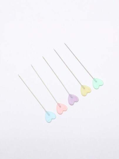 50个/100个/180个塑料盒装，内含浅色装饰定位针、大号定位针和手工缝制的心形定位针