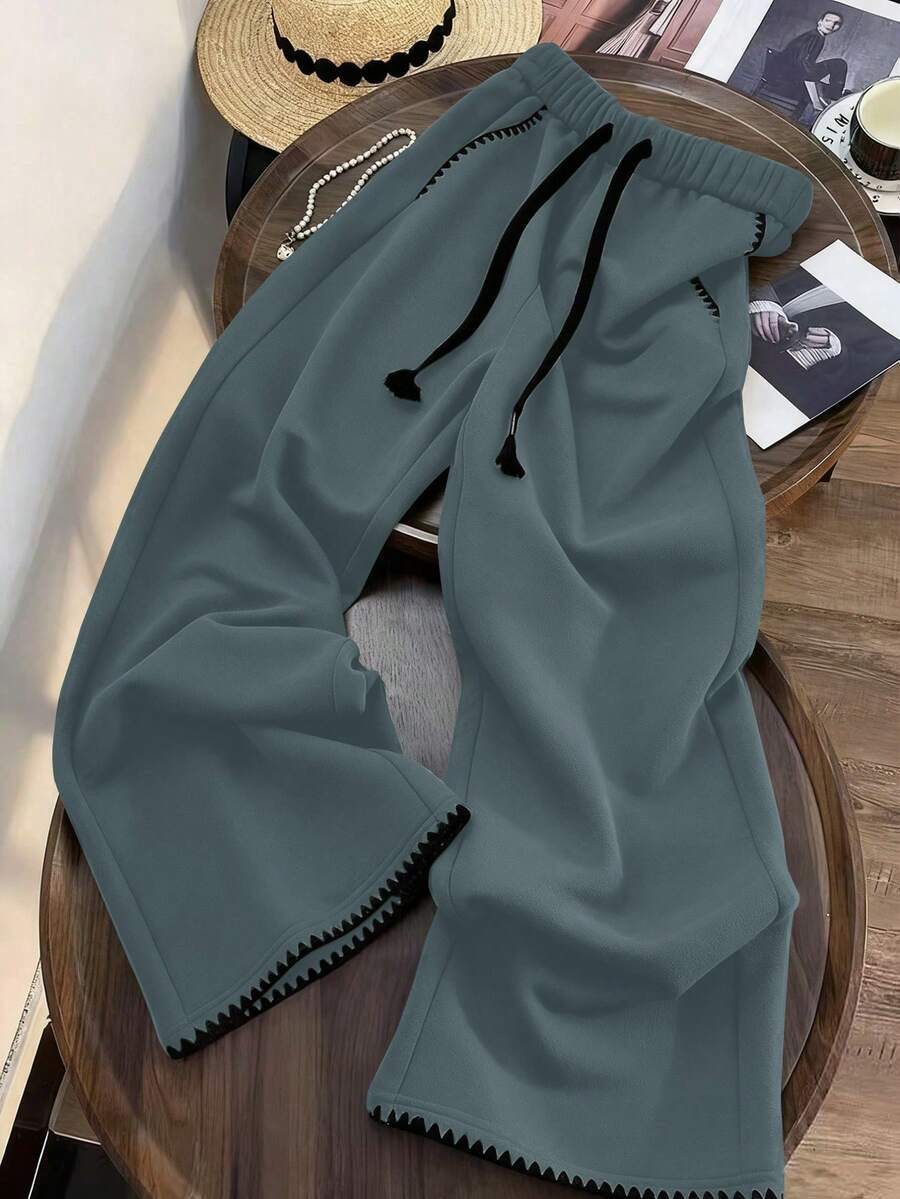 GlowEve CURVE Quần dài thể thao dáng rộng phối màu tương phản cỡ lớn, mùa xuân/thu, viền thêu tương phản, quần jogger ống rộng màu trơn có dây rút ở eo và túi, buộc dây ở mắt cá chân, kiểu dáng thường ngày. - Màu xanh bụi bặm - Xem 1