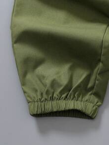 2pcs/Set Young Boys' Outfit, Includes White Short Sleeve T-Shirt With "COOLEST" Graffiti Print And Military Green Cargo Pants. Casual And Style To Showcase Kids' Lively And Energetic Personalized.