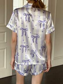 SHEIN Bộ đồ ngủ nữ 2 món gồm áo ngắn tay và quần đùi, họa tiết sọc, thắt nơ, có túi, thích hợp cho mùa xuân/hè/thu. - Nhiều màu - Xem 2