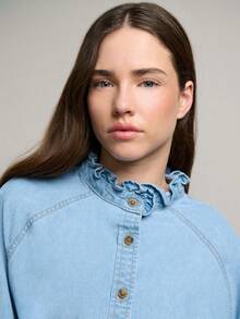 Nöista Light Blue Denim Blouse Features A Ruffled Collar, Button-Down Front, And Puffed Sleeves With Ruffled Cuffs. Waist Tie, The Peplum Silhouette For A Flattering Fit. Spring, Summer. - Light Wash - View 6