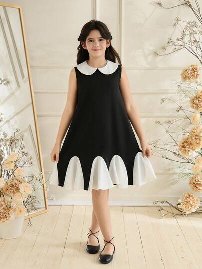 女童无袖连衣裙，黑白拼接荷叶边下摆，时尚休闲百搭，适合春夏穿着