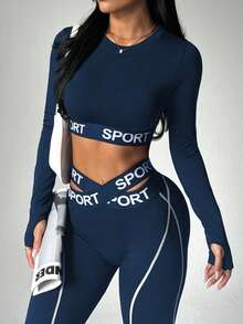 Dewbera 两件套女士无缝撞色条纹图案交叉腰带跑步健身瑜伽运动长袖带拇指孔外套和七分紧身裤运动套装 - 藏蓝色 - 查看 7