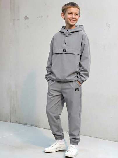 Vacaura Set de 2 piezas: Chaqueta con capucha y media cremallera minimalista de estilo urbano para adolescentes, emparejada con pantalones tejidos entallados. La chaqueta tiene un logotipo bordado, tela cómoda y colores versátiles, adecuada para la escuela y el uso casual, otoño/invierno