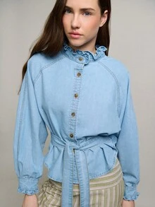Nöista Light Blue Denim Blouse Features A Ruffled Collar, Button-Down Front, And Puffed Sleeves With Ruffled Cuffs. Waist Tie, The Peplum Silhouette For A Flattering Fit. Spring, Summer. - Light Wash - View 4