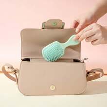 造型按摩头小气垫梳，软齿顺发梳，气垫长发便携式护发梳 - 彩色 - 查看 1