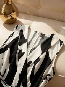 Franclia This Women's Black And White Abstract Print Deep V-Neck High-Waisted Jumpsuit With A Tie Is Suitable For Summer, Spring, Valentine's Day, Carnivals, Beach, Parties, Birthdays, Elegant Occasions, Vacations, Casual Wear, And Graduation Seasons. (Summer Outfits, Women's Summer Outfits, Spring Outfits, Spring Break Outfits, Women's Valentine's Day Outfits, Carnival Outfits, Women's Party Jumpsuits, Women's Elegant Outfits, Women's Holiday Outfits, Summer Vacation Outfits, Women's Casual Jumpsuits, White Jumpsuits, Women's Casual Wear)Fashionable Casual Commuter Wear, Business Office Wear, Versatile And Stylish Everyday Casual Wear, Urban Teacher's Professional Attire - Black and White - View 6