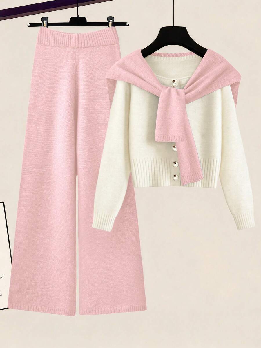 Franclia Bộ đồ hai mảnh thời trang nữ gồm áo len phối màu, áo khoác dáng dài cổ tròn tay raglan phối màu tối giản và quần ống rộng cạp chun màu xanh navy. - Hồng - Xem 1