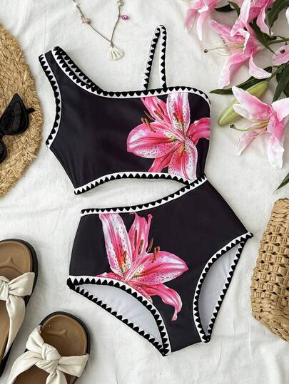 少女休闲简约沙滩度假风黑色吊带镂空贝壳花卉百合印花连体泳衣，夏季
