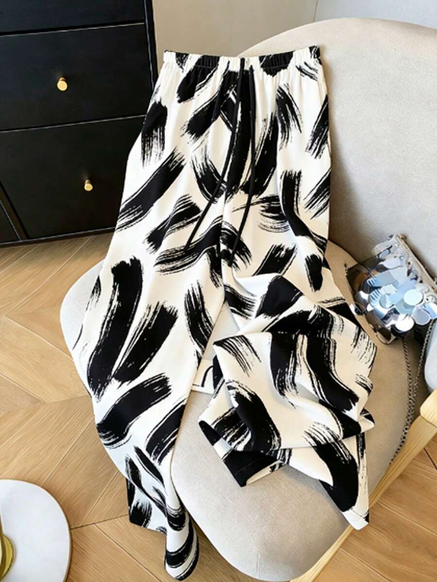 GlowEve 女士优雅百搭黑白印花阔腿轻便休闲裤，适合通勤和度假穿着 - 彩色 - 查看 1