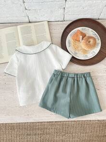 SHEIN 两件套幼儿男童清新可爱绿色条纹套装，包括翻领短袖衬衫和绿色短裤，适合优雅场合、婚礼宾客、花童、戒指童、婚礼、婴儿派对、洗礼和一周岁生日庆祝。 - 綠色 - 查看 2