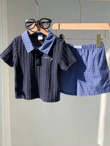 SHEIN 2pcs Newborn Baby Boy Summer Cute Preppy Style Navy Short Sleeve Polo Shirt And Elastic Waist Plaid Shorts Set, Suitable For Birthday Party, Rave, Evening Party, Performance, Wedding, One Month Celebration, Baptism And First Birthday Boys Vacation Outfit Sets Baby Boy Shirt And Short Set Boy Summer Sets - Multicolor - View 9