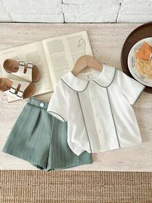 SHEIN 两件套幼儿男童清新可爱绿色条纹套装，包括翻领短袖衬衫和绿色短裤，适合优雅场合、婚礼宾客、花童、戒指童、婚礼、婴儿派对、洗礼和一周岁生日庆祝。 - 綠色 - 查看 5