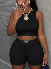 Slaydiva Bộ 2 món phong cách tối giản thường ngày: áo croptop cổ tròn không tay và quần short ôm eo cạp cao, chất liệu dệt kim gân dành cho nữ. - màu đen - Xem 4
