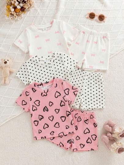SHEIN Playful Pals 3 Sets Baby Girls Cute Casual Summer Outfits Heart Bowknot Print Polka Dot Pink White Ribbed Texture Short Sleeve Crew Neck T-Shirts Tops And Shorts Set Soft Stretchy Toddler Infant Daily Playwear Clothing Suits Valentine's Day Gift Toddler Girl Tops Sets Baby Girl Heart Outfit Baby Casual Sets Baby Clothes Girl Pink