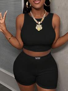 Slaydiva Bộ 2 món phong cách tối giản thường ngày: áo croptop cổ tròn không tay và quần short ôm eo cạp cao, chất liệu dệt kim gân dành cho nữ. - màu đen - Xem 8