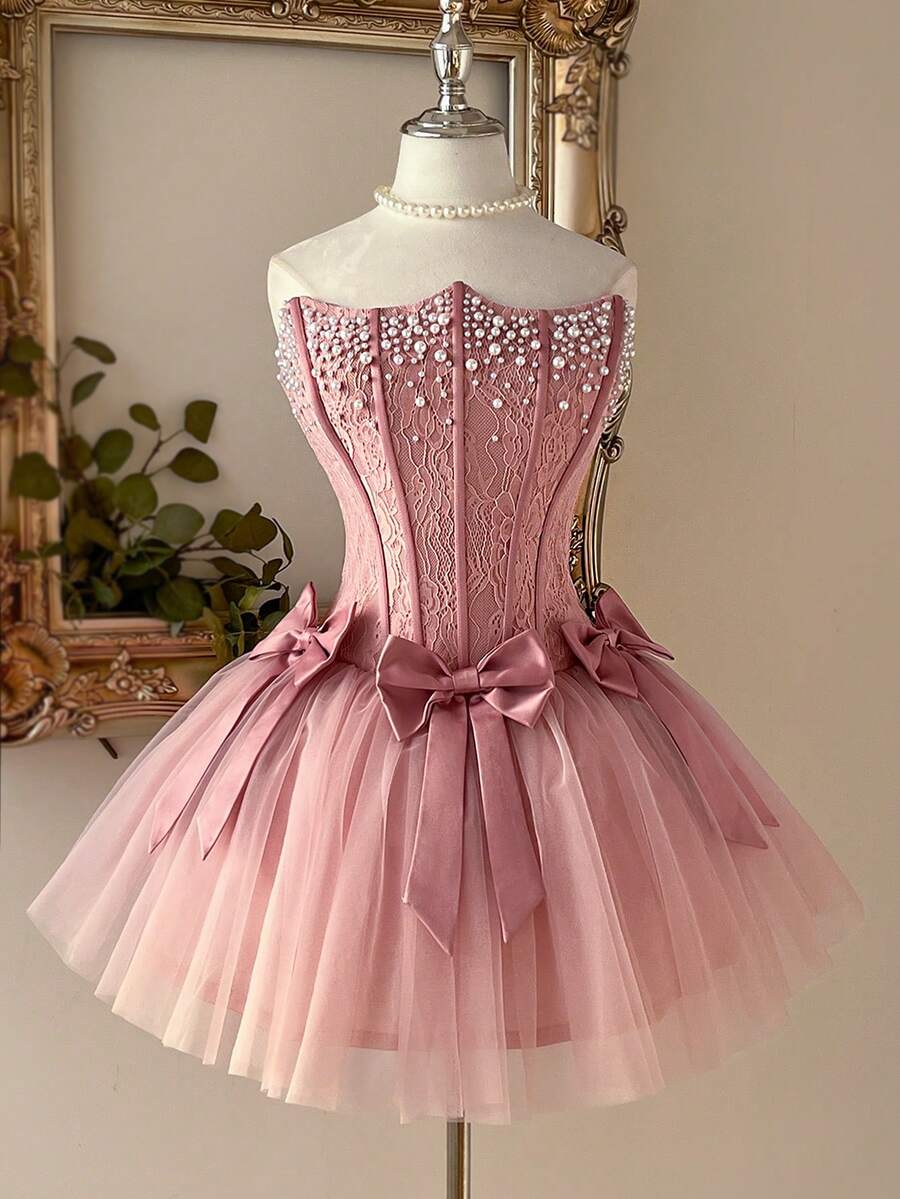 Lovelzi 优雅的淡粉色浪漫蕾丝网纱抹胸连衣裙，配有可拆卸蝴蝶结后背和可调节肩带，适合海滩、约会、生日、派对、毕业典礼、婚礼、舞会、情人节等场合。 - 藕粉色 - 查看 1