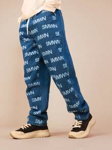 SUMWON Boys Denim Pull On Elastic Waist Jogger Jeans With All Over Logo Print Pattern Casual Streetwear Vacation - Medium Wash - View 6