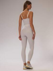 Musera Sport Bộ đồ thể thao gồm áo crop top ôm sát phối viền tương phản và quần legging cạp cao chéo, chất liệu co giãn, thích hợp cho tập luyện thể thao, trượt tuyết, thể dục, trượt tuyết địa hình, yoga, pilates, mặc hàng ngày và mùa hè. - Nhiều màu - Xem 4