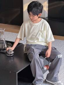 2pcs Tween Boy Loose Fit Round Neck Short Sleeve T-Shirt With Cargo Pocket & Contrast Color Pants Set, Casual, Sports, Vacation, School, Party, Fashion Versatile, Spring/Summer - White - View 3