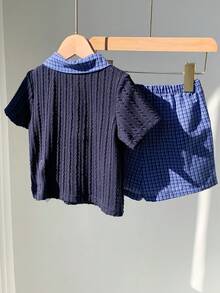 SHEIN 2pcs Newborn Baby Boy Summer Cute Preppy Style Navy Short Sleeve Polo Shirt And Elastic Waist Plaid Shorts Set, Suitable For Birthday Party, Rave, Evening Party, Performance, Wedding, One Month Celebration, Baptism And First Birthday Boys Vacation Outfit Sets Baby Boy Shirt And Short Set Boy Summer Sets - Multicolor - View 2