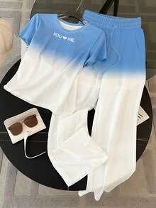 Resyla T-shirt med rund hals och korta ärmar i regular fit + byxor med raka ben och sneda fickor - Blå - Visa 1