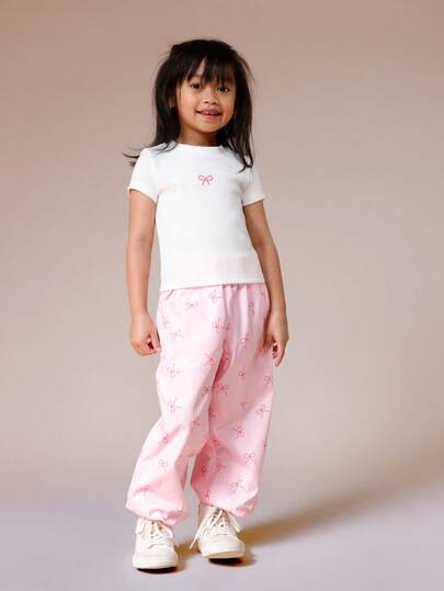 SUMWON Conjunto de pijama con camiseta de manga corta y pantalón de pierna ancha con estampado de lazo para niñas