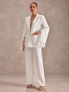 CLARA VERO Bộ vest ống rộng viền ren trắng: Áo blazer ôm dáng và quần cạp cao, hoàn hảo cho những ngày làm việc thanh lịch hoặc các sự kiện sang trọng, được làm từ chất liệu polyester cao cấp với điểm nhấn ren tinh tế và khuy cài hình trái tim. - trắng - Xem 5
