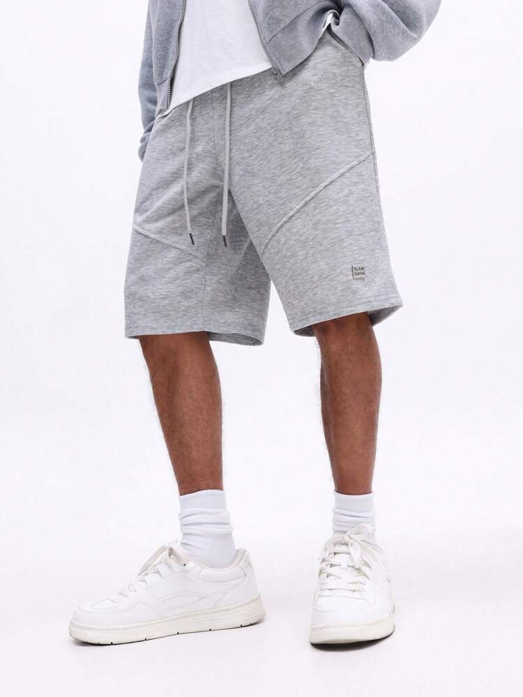 Melierte Shorts mit Kordelzug und Taschen