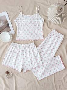 SHEIN Conjunto de 3 piezas de pijama para adolescentes, ropa de estar en casa informal con estampado de moño, incluye camiseta, pantalón largo y shorts - Rosa - Ver 2