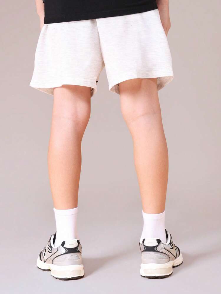 Pantaloncini in jersey con stampa del testo Tokyo