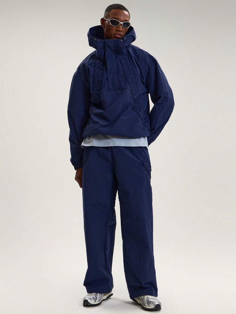 Musero Quần thể thao dáng rộng, cạp chun co giãn, chi tiết nhún bèo, chất liệu shell, bộ đồ thể thao mùa Xuân Hè, phong cách đường phố. - Màu xanh hải quân - Xem 1