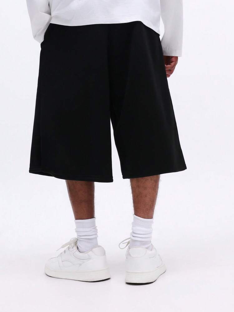 Pantaloni neri a gamba larga