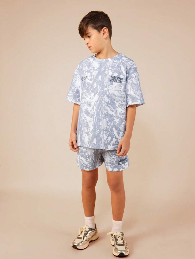 Zestaw: koszulka i spodenki w kamuflażu z nadrukiem